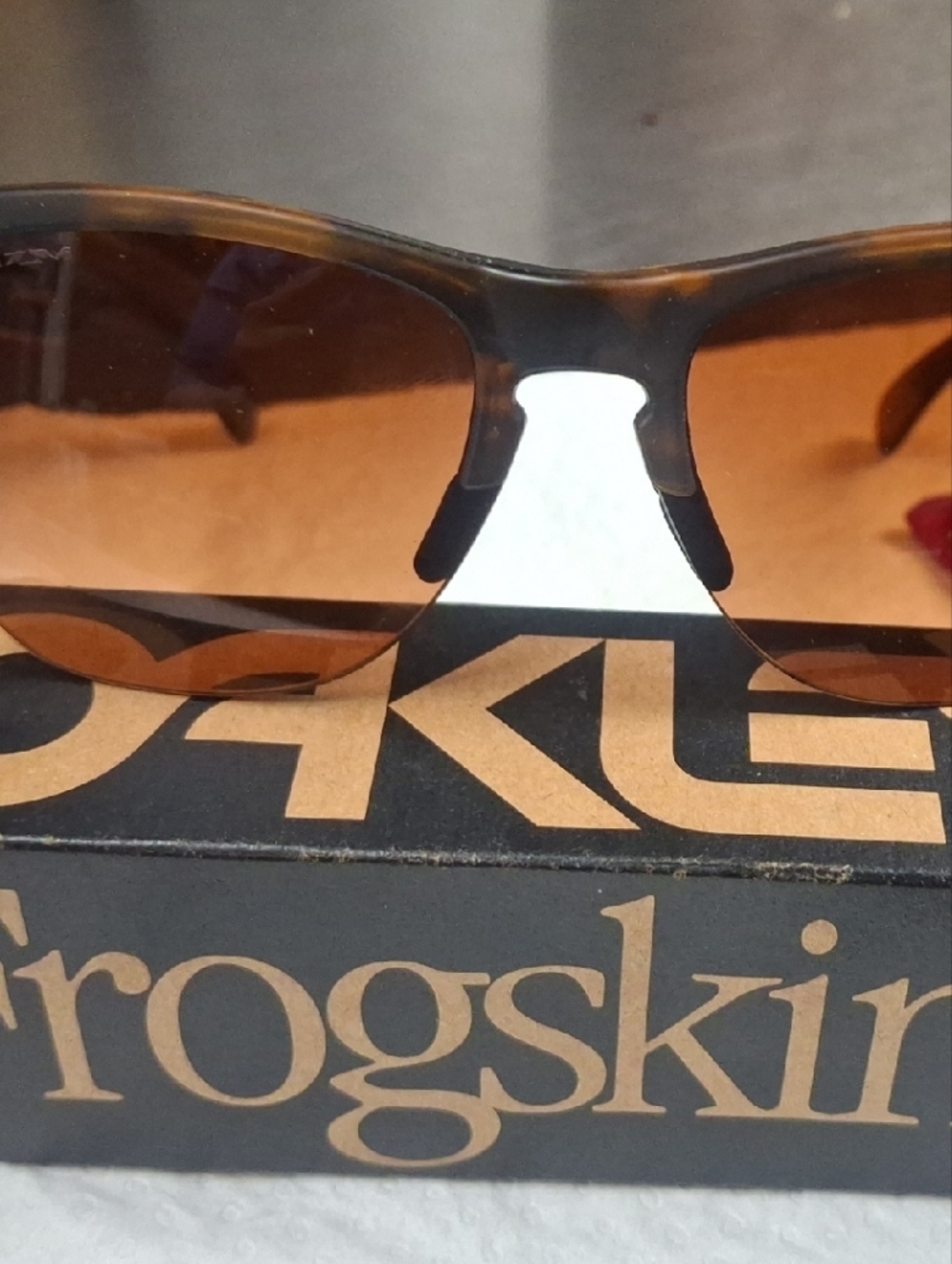 Oakley Tortoise Frame Sunglasses with Brown Lenses